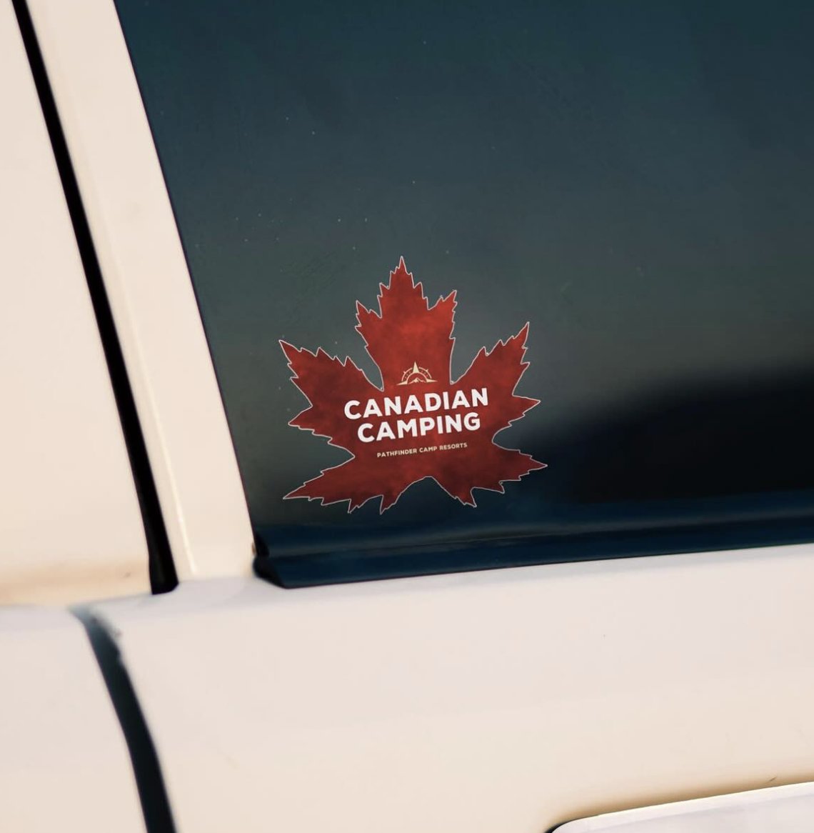 Canadian Camping maple leaf sticker on a car window